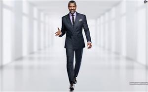 Denzel Washington walking for a photoshoot